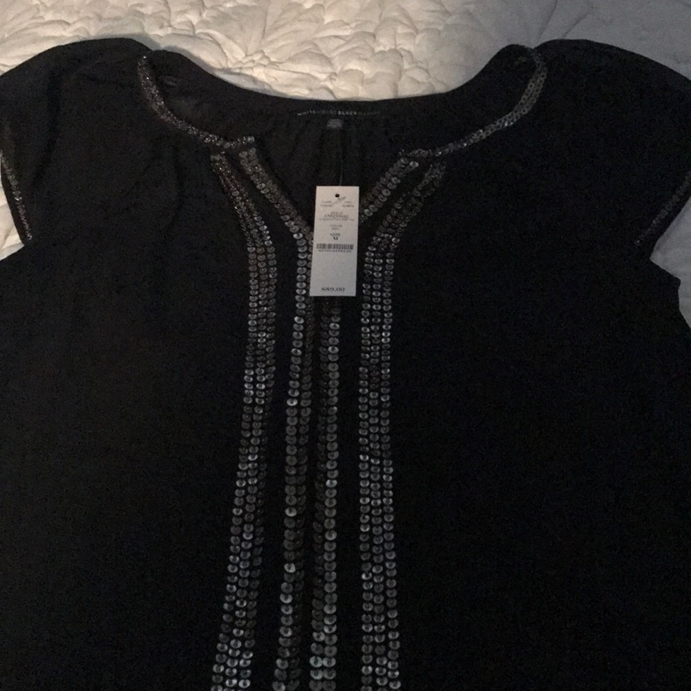 Beautiful black sequin top with sheer sleeves